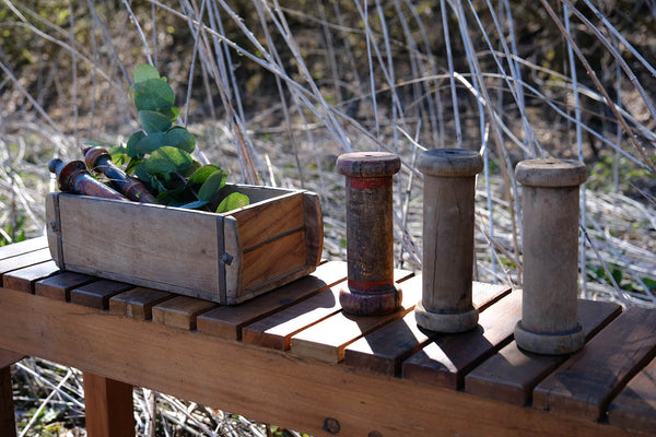 Old wooden thread spool